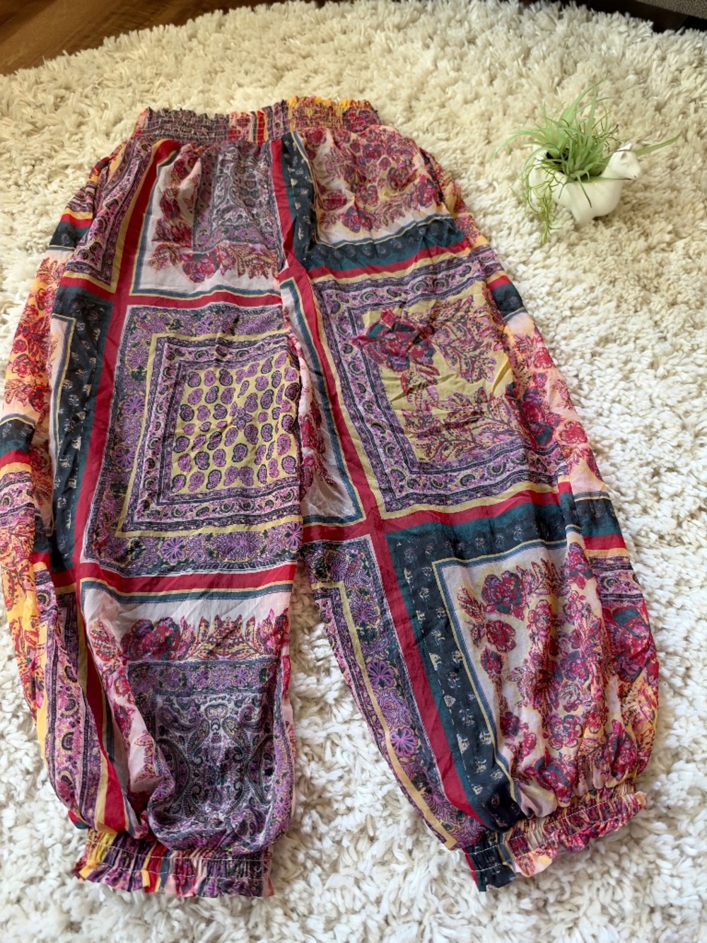 Free people paisley jogger pants with an elastic waistband, gathered cuffs, and